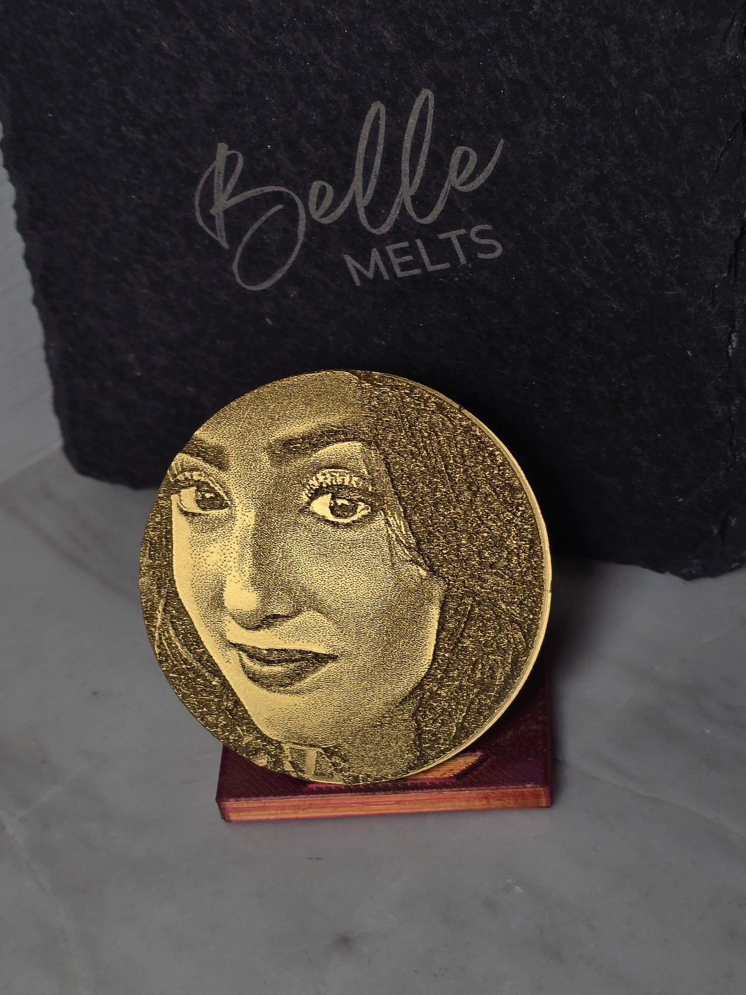 "Belle Melts Custom Home Fragrances display showcasing personalized home fragrance products with custom designs."