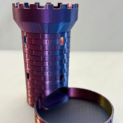Metallic purple and blue cylindrical object on a white background - Dice Tower