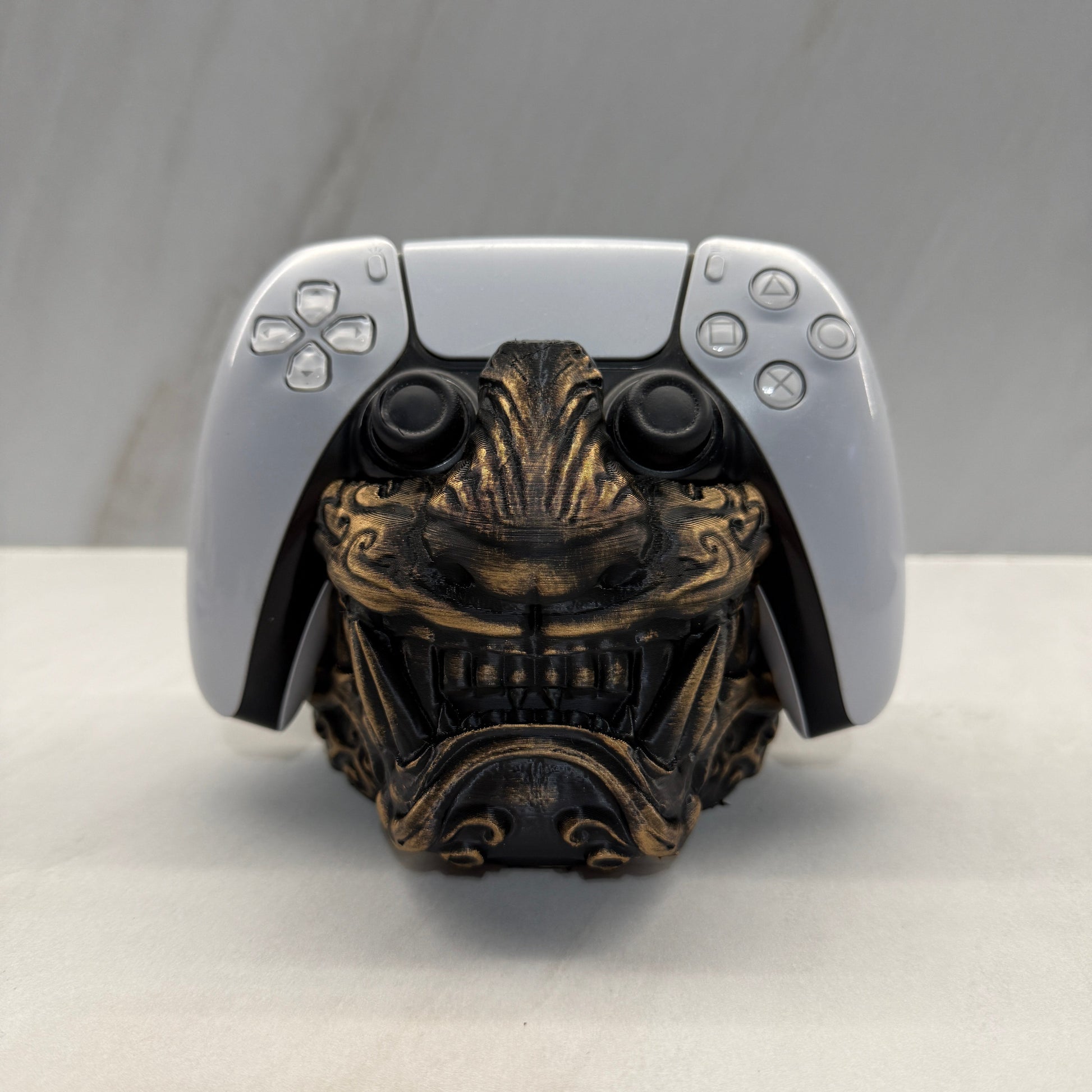 Decorative door handle with intricate design on a white door