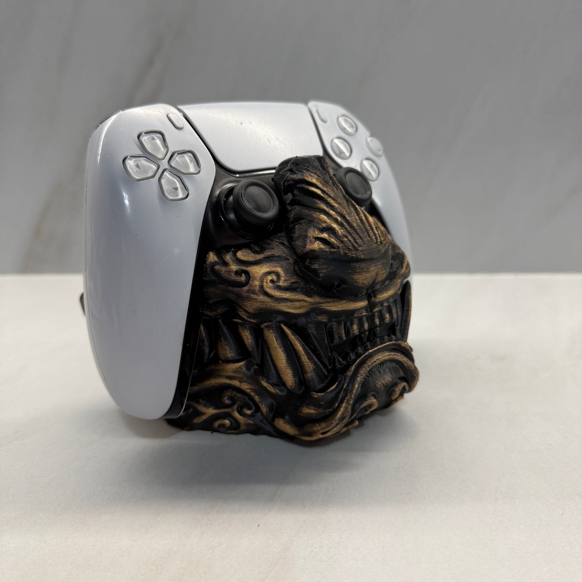 Decorative door handle with intricate design on a white door