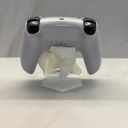 Handheld device with a white cloth attached to it on a light gray background