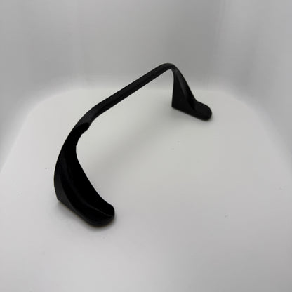 Black earbud on a white background