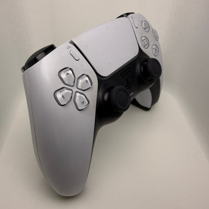 Close-up of a gaming controller on a light gray background