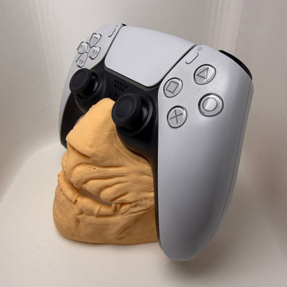 Control panel with buttons and a yellow glove on a light gray background